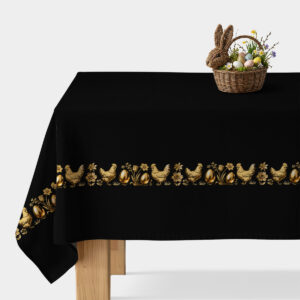 czarny obrus ze złotym bordiurem z kurkami i jajkami na stole, ujęcie z przodu