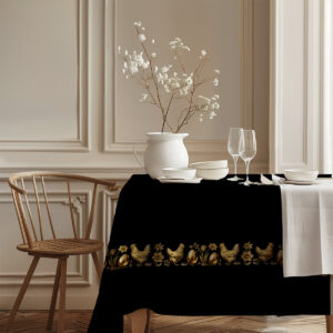 narożnik stołu z czarnym obrusem i subtelną złotą bordiurą w eleganckim wnętrzu
