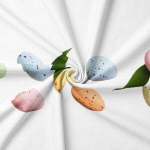 zbliżenie na nadruk pastelowych pisanek i liści na tkaninie