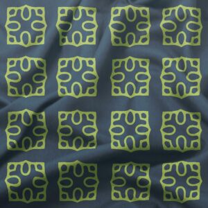 zbliżenie na tkaninę z powtarzalnym wzorem limonkowych kafelków na granacie