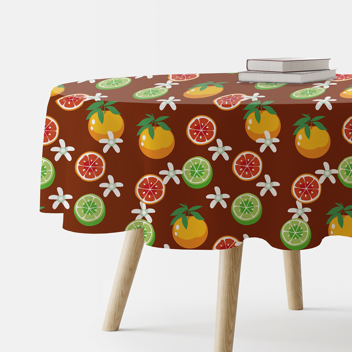 Okrągły obrus na stole z wzorem cytrusów i białych kwiatków na brązowym tle