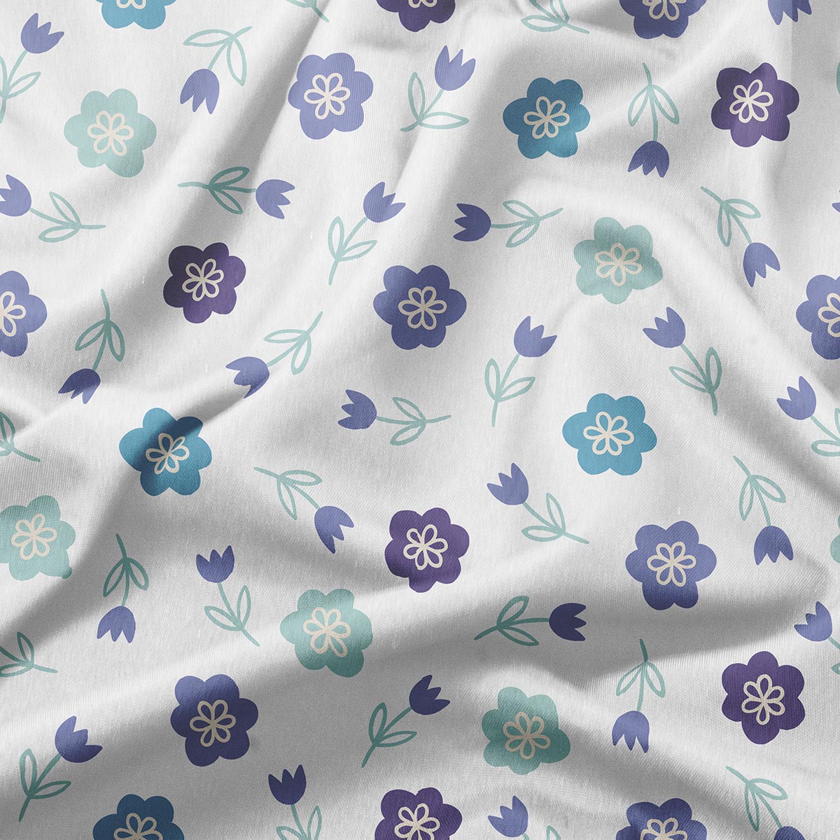zbliżenie tkaniny pokazujące pastelowe kwiaty i delikatną fakturę materiału