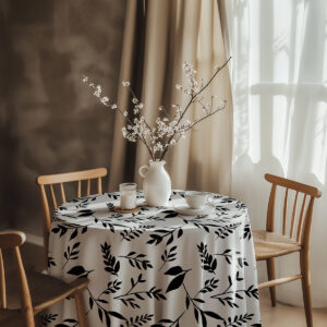 aranżacja stołu z obrusem, wazonem z gałązkami i naczyniami
