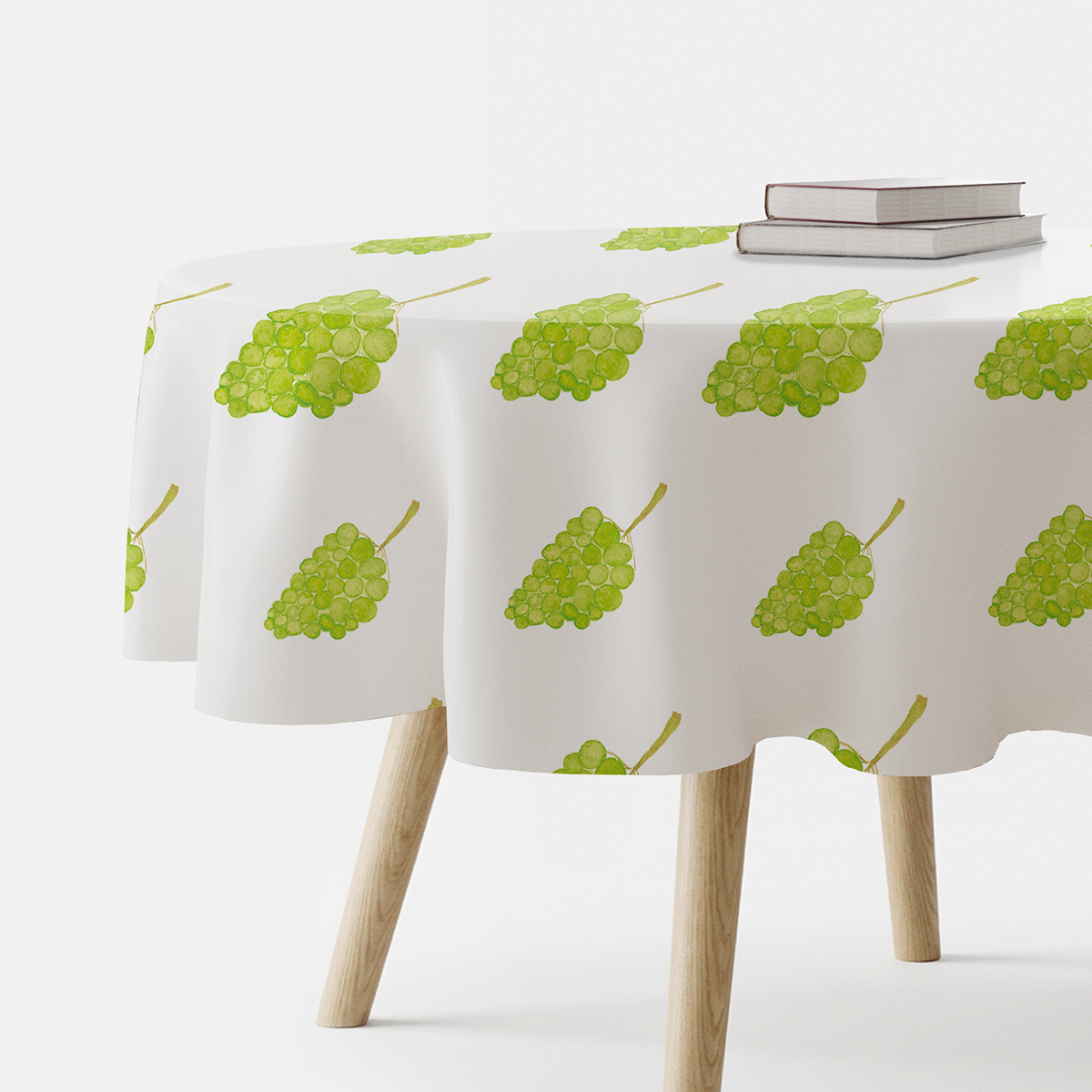 okrągły obrus na stole z wzorem akwarelowych kiści winogron widok boczny