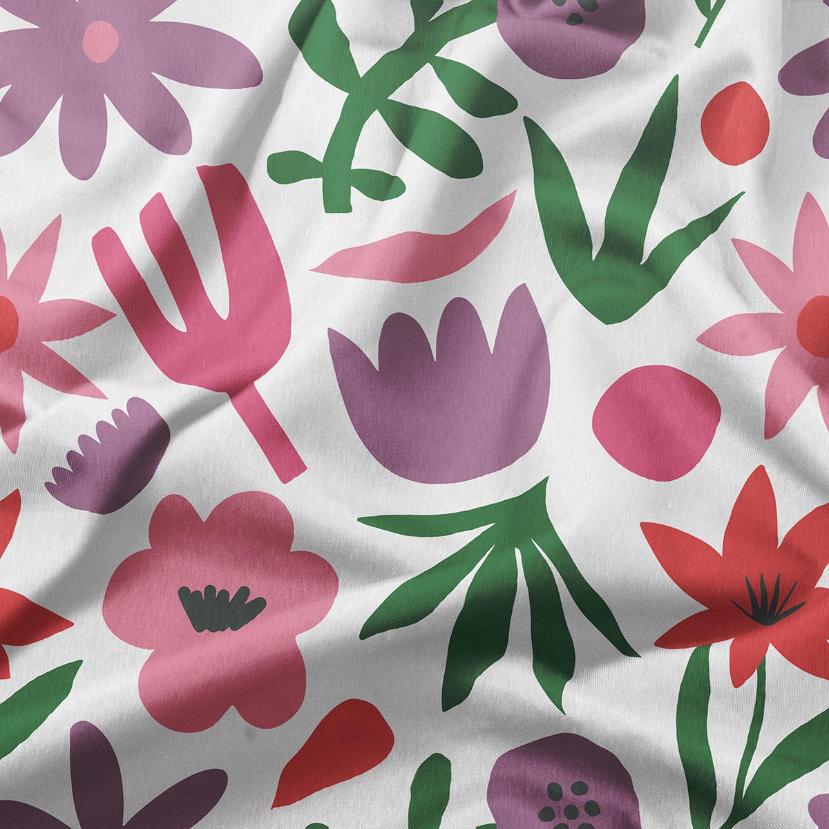 Detal tkaniny z różowymi, fioletowymi i zielonymi elementami wzoru kwiatowego