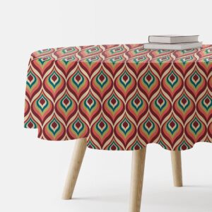 Okrągły obrus z retro wzorem łezek na stole, widok z boku