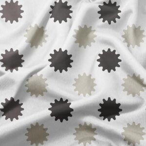 zbliżenie na tkaninę obrusy z szaro-beżowymi i ciemnymi motywami rozbłysków