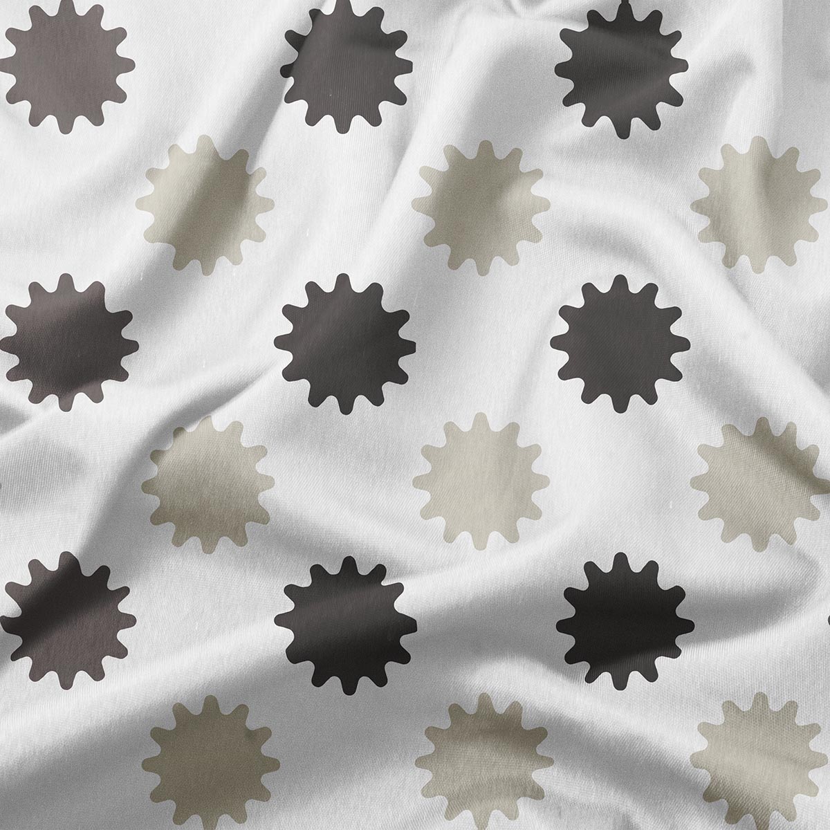 zbliżenie na tkaninę obrusy z szaro-beżowymi i ciemnymi motywami rozbłysków