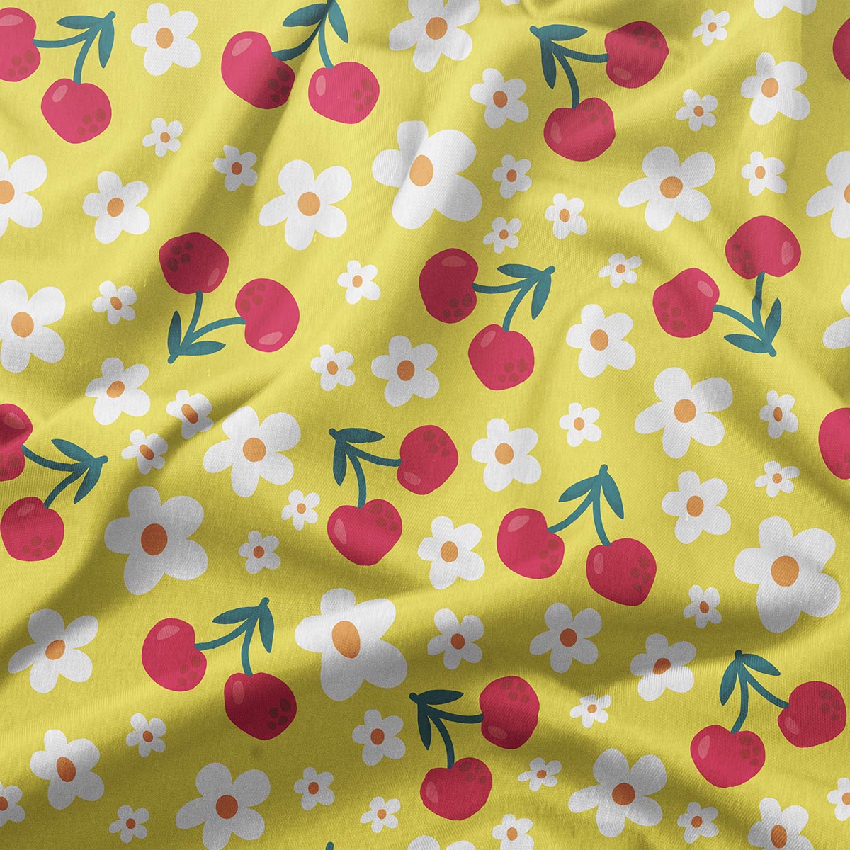 Zbliżenie na tkaninę pokazujące detale wzoru wiśni i stokrotek oraz fakturę materiału