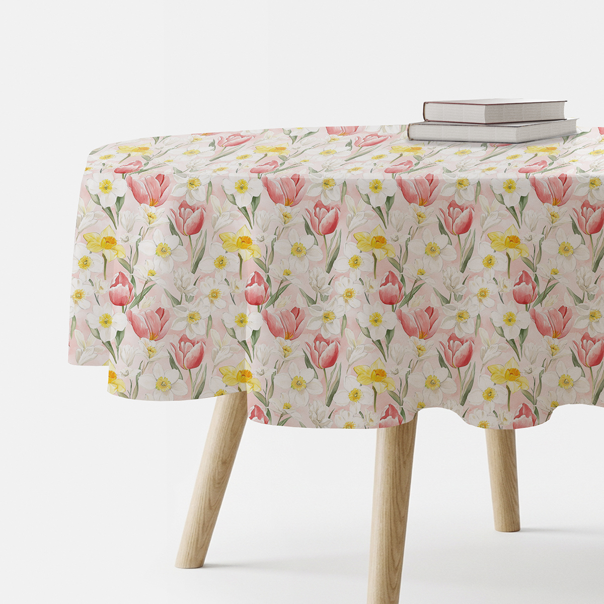 okrągły obrus na stole z wiosennym wzorem tulipanów i żonkili