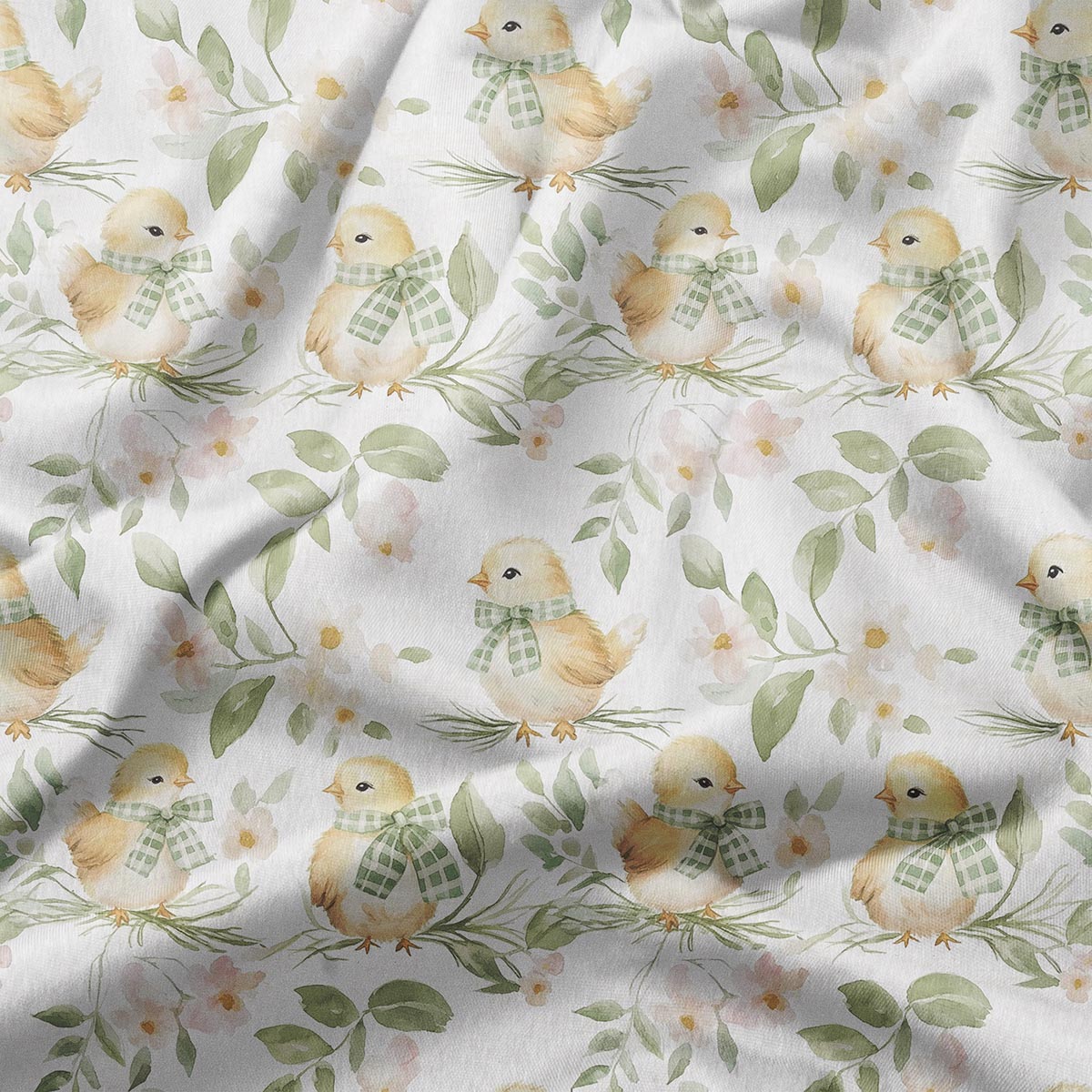 zbliżenie na wzór z kurczaczkiem w zielonej kokardce i akwarelowymi listkami