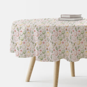 okrągły obrus z motywem akwarelowych pisanek i wiosennych gałązek na stole