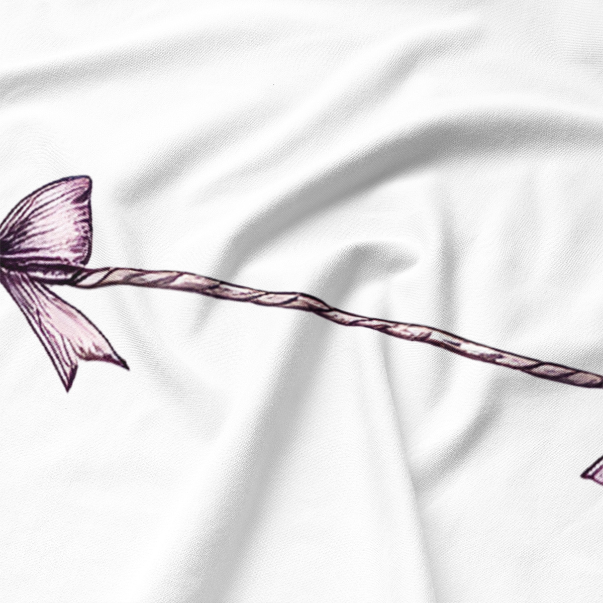 zbliżenie na nadrukowaną kokardkę i fakturę tkaniny podkładki