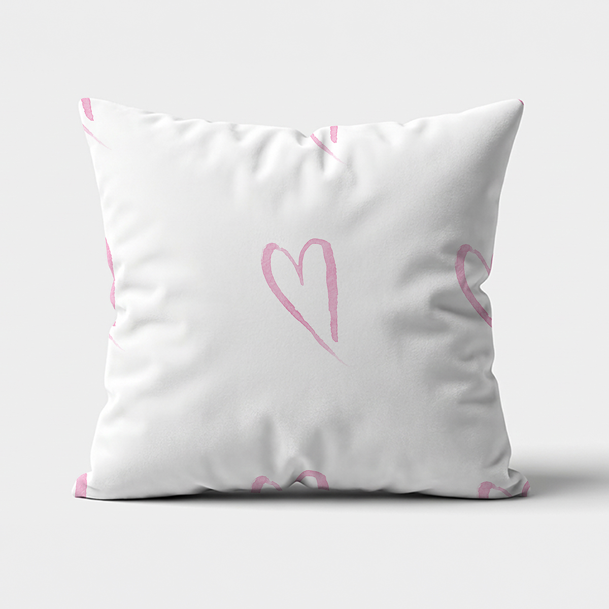 biała poduszka dekoracyjna z różowym akwarelowym sercem widok z przodu
