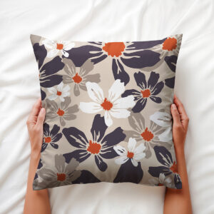 Zbliżenie na wzór i fakturę tkaniny z białymi i grafitowymi płatkami oraz ceglastymi środkami