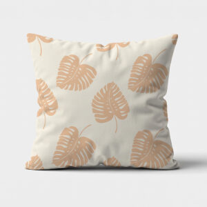 Poduszka ozdobna z beżowymi liśćmi na jasnym tle, widok na przód produktu