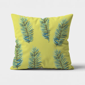 Główne ujęcie poduszki dekoracyjnej z liśćmi palmowymi na limonkowym tle