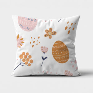 Poduszka z nadrukiem pisanek i delikatnych kwiatów na białym tle — ujęcie frontowe produktu