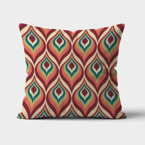 Poduszka dekoracyjna z retro wzorem łezek w ciepłych bordowo-koralowych i turkusowych odcieniach na jasnym tle