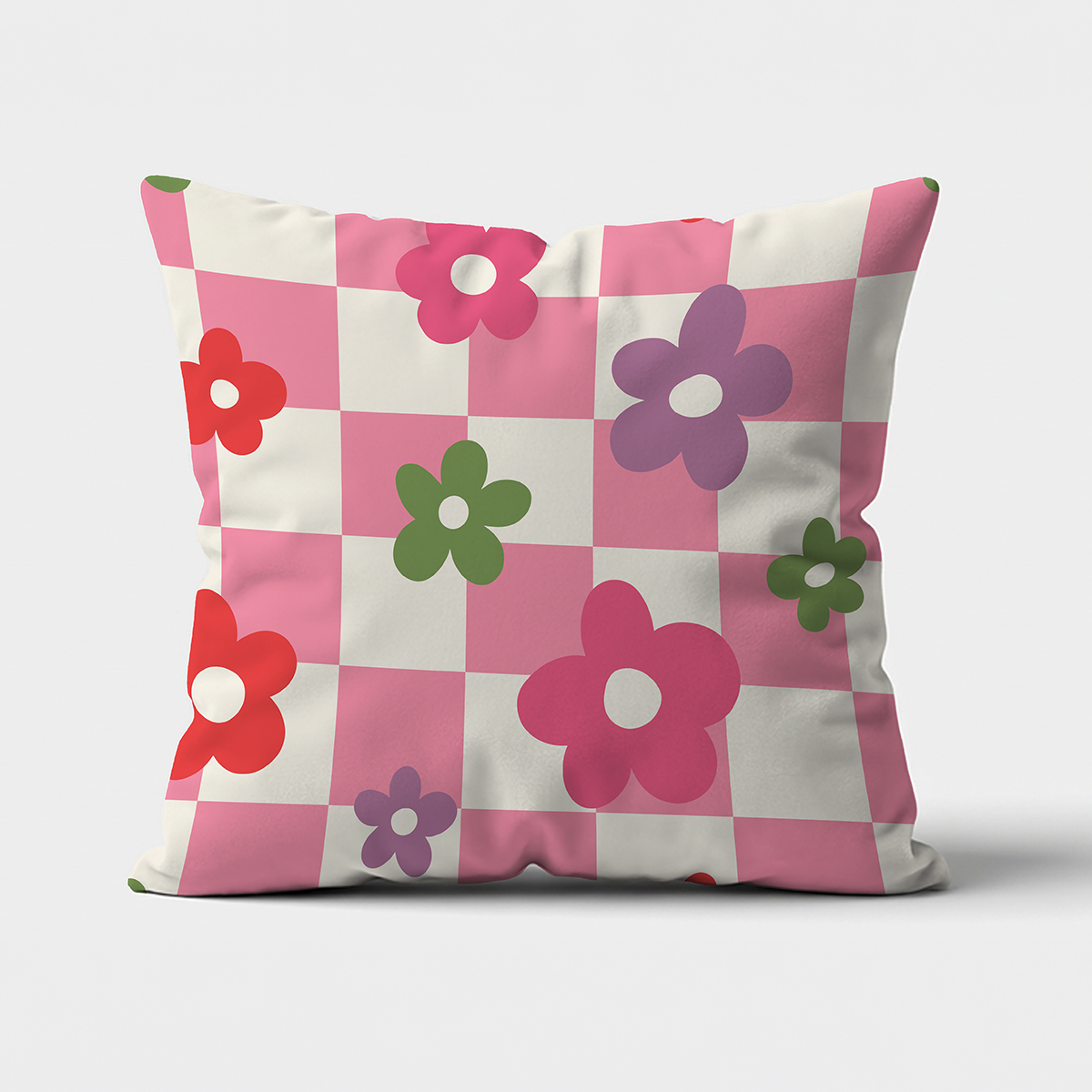 Poszewka na poduszkę z różową kratką i kolorowymi kwiatami, widok z przodu