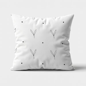 biała poduszka dekoracyjna z cienkim czarnym wzorem listków i małymi kropkami, widok z przodu
