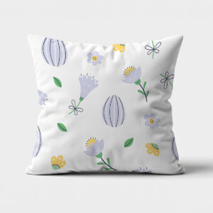 Poduszka z pastelowym wzorem kwiatowym i ozdobnymi jajkami na białym tle