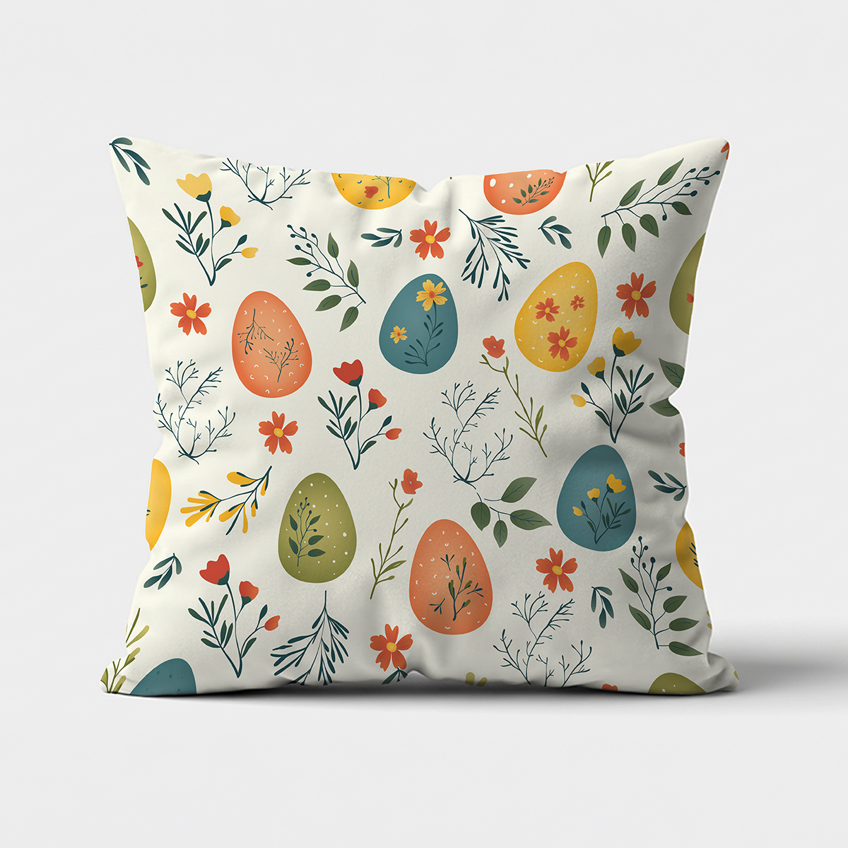 Front poduszki z motywem pisanek i listków na kremowym tle