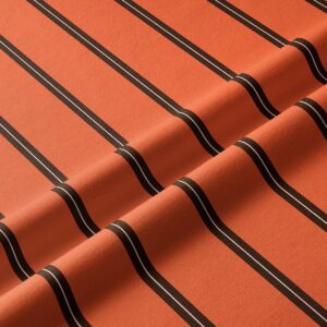 Zbliżenie na fakturę tkaniny i kontrastowe brązowe pasy bieżnika