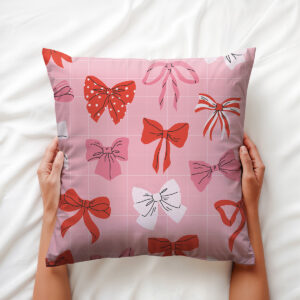 Detale wzoru z czerwonymi, różowymi i białymi kokardkami na subtelnej kratce