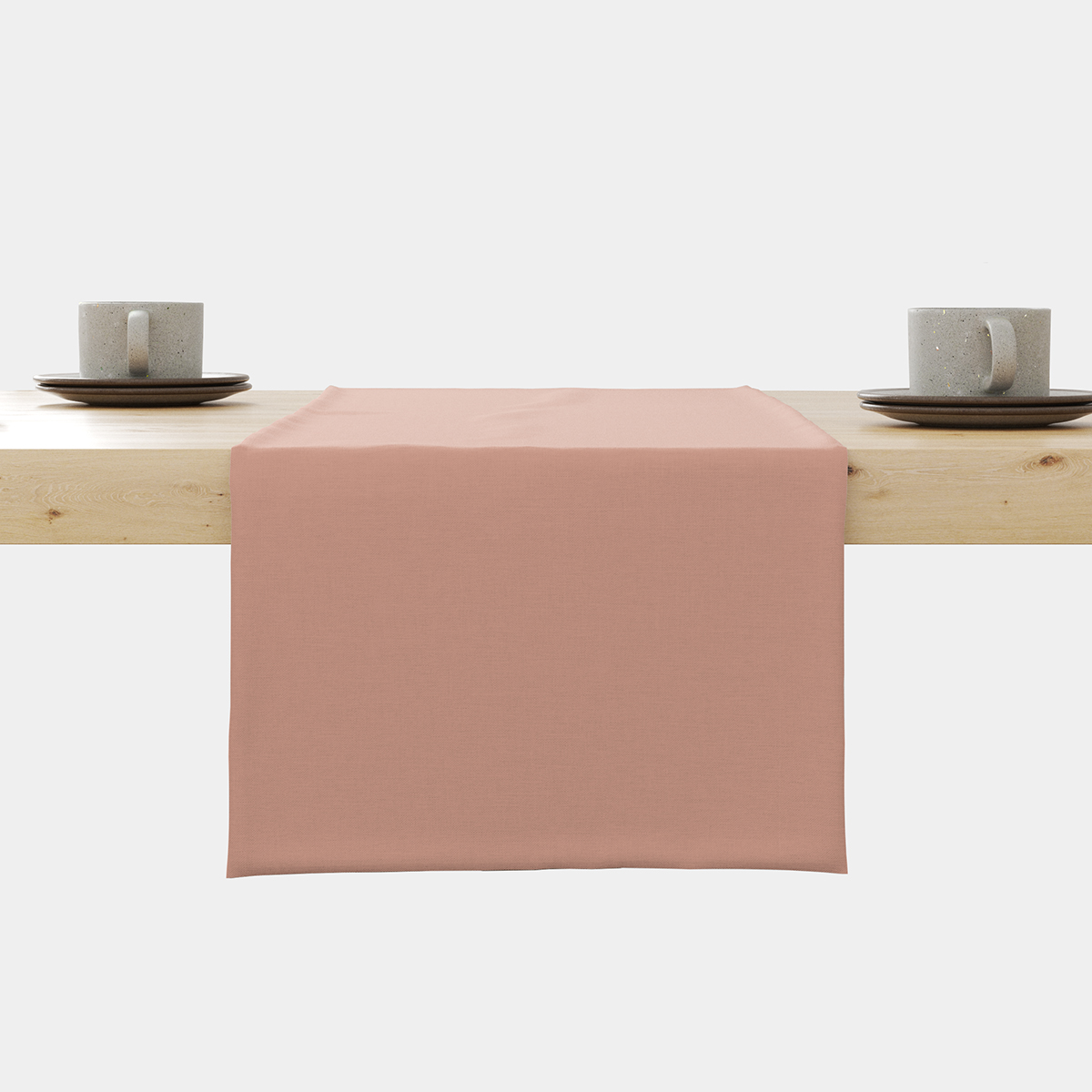 bieżnik ułożony na stole, główne ujęcie pokazujące gładką pudrową tkaninę