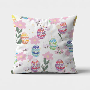 Poduszka z wzorem pastelowych pisanek i różowych kwiatów na białym tle, widok z przodu