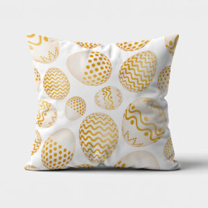 główne ujęcie poduszki z białym tłem i złotymi pisankami