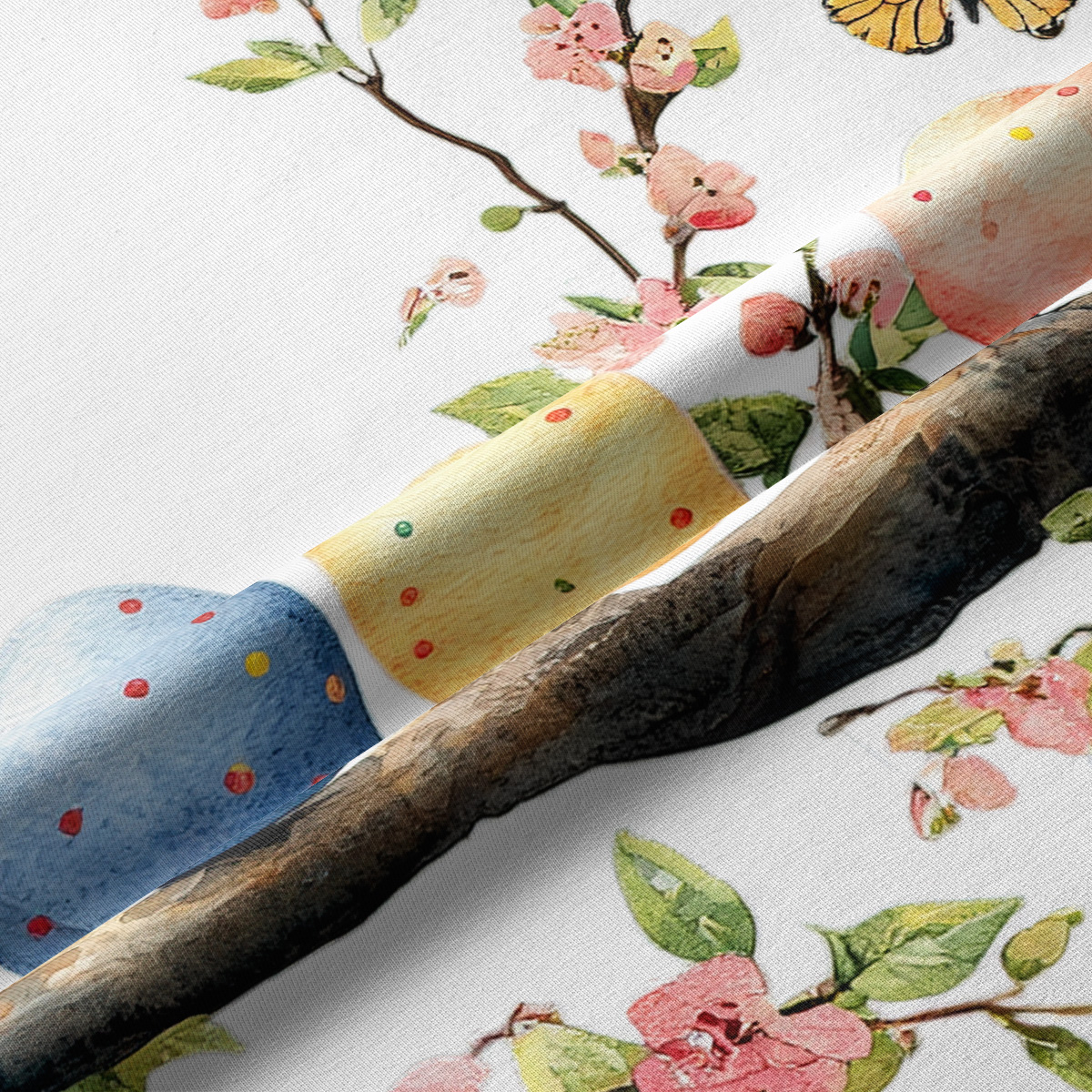 Zbliżenie na tkaninę z akwarelowym wzorem pisanek, kwiatów i motyli oraz fakturą materiału