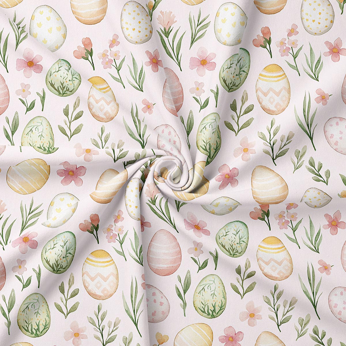 zbliżenie na materiał z akwarelowymi pisankami, kwiatkami i wiosennymi gałązkami