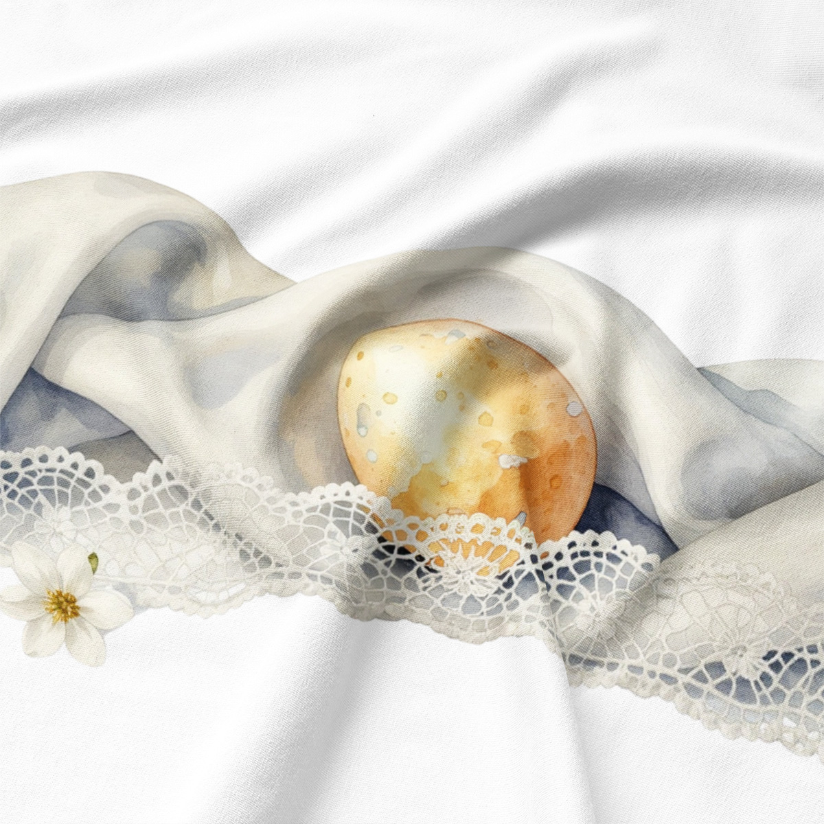 Detal: akwarelowa pisanka ułożona przy koronce na materiale podkładki