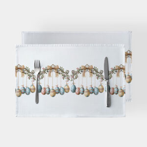 Biała podkładka z wzorem wiszących pisanek i dekoracyjną girlandą na środku stołu