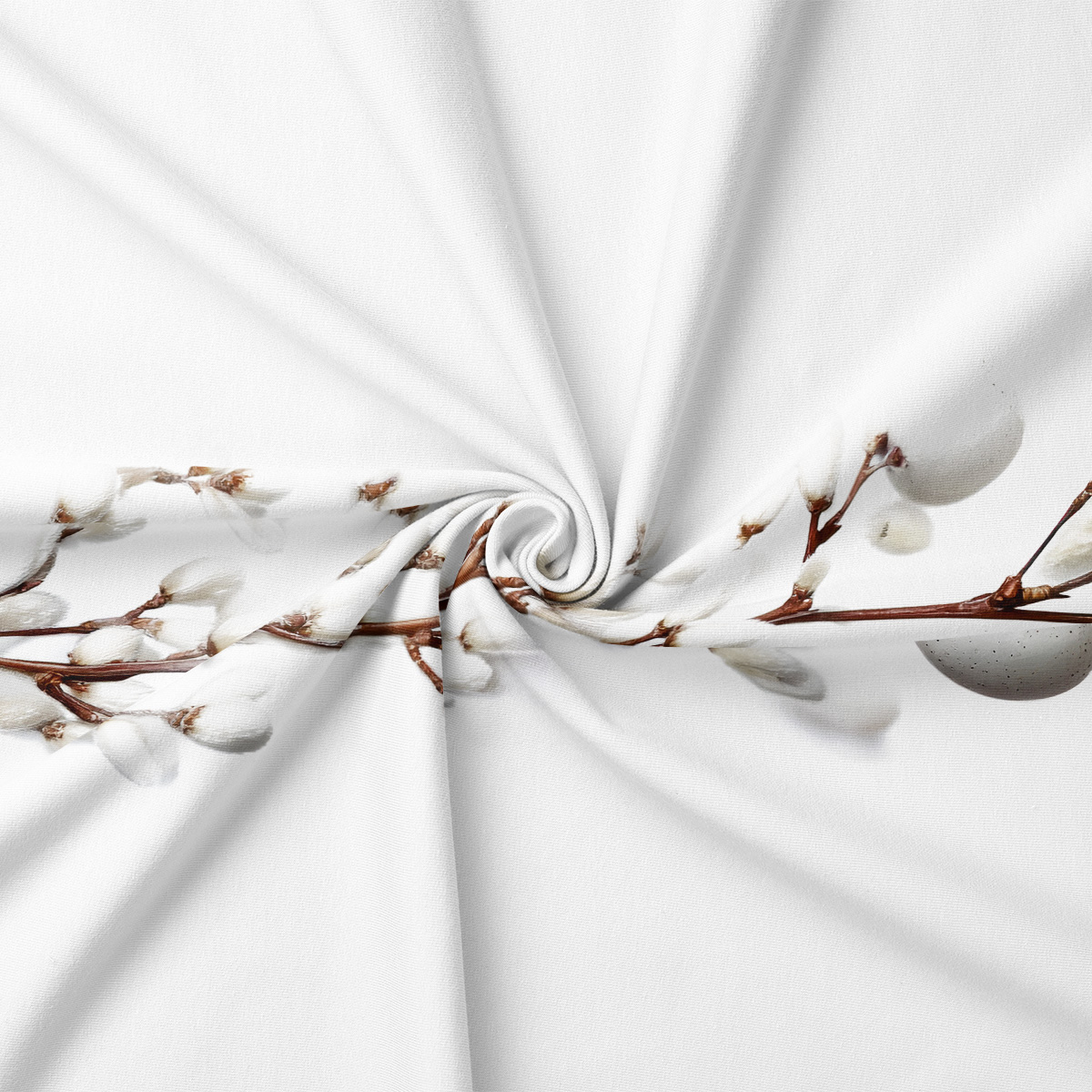 detal nadruku z delikatnymi bazami i pastelowymi jajkami na tkaninie