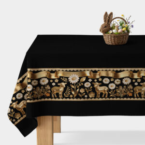 czarny obrus z bordiurą ze złotymi barankami, kwiatami i wstęgą na stole