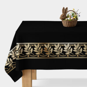 Czarny obrus ze złotym bordiurem z gałązkami i łańcuszkami, aranżacja z wiklinowym koszykiem