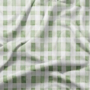 zbliżenie na tkaninę z delikatną zieloną kratką i fakturą materiału