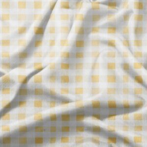zbliżenie na fakturę materiału i drobne żółte kwadraty wzoru