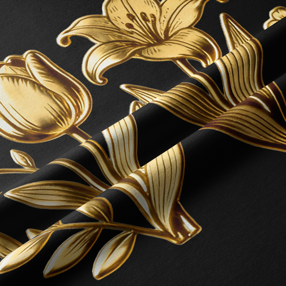 Zbliżenie na złote lilie i tulipany drukowane na czarnej, teksturowanej tkaninie