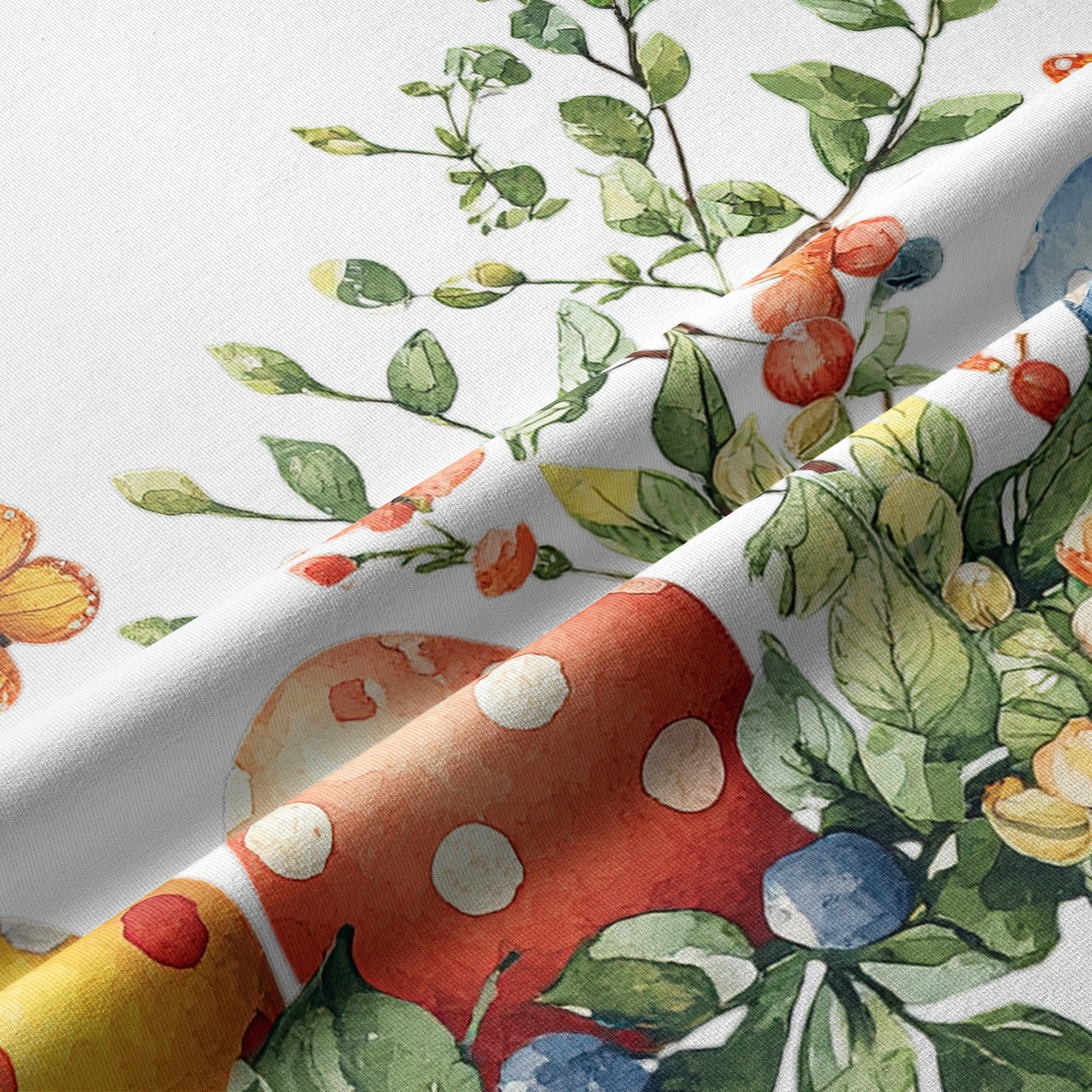 Zbliżenie tkaniny pokazujące akwarelowe jajka, liście i detale nadruku