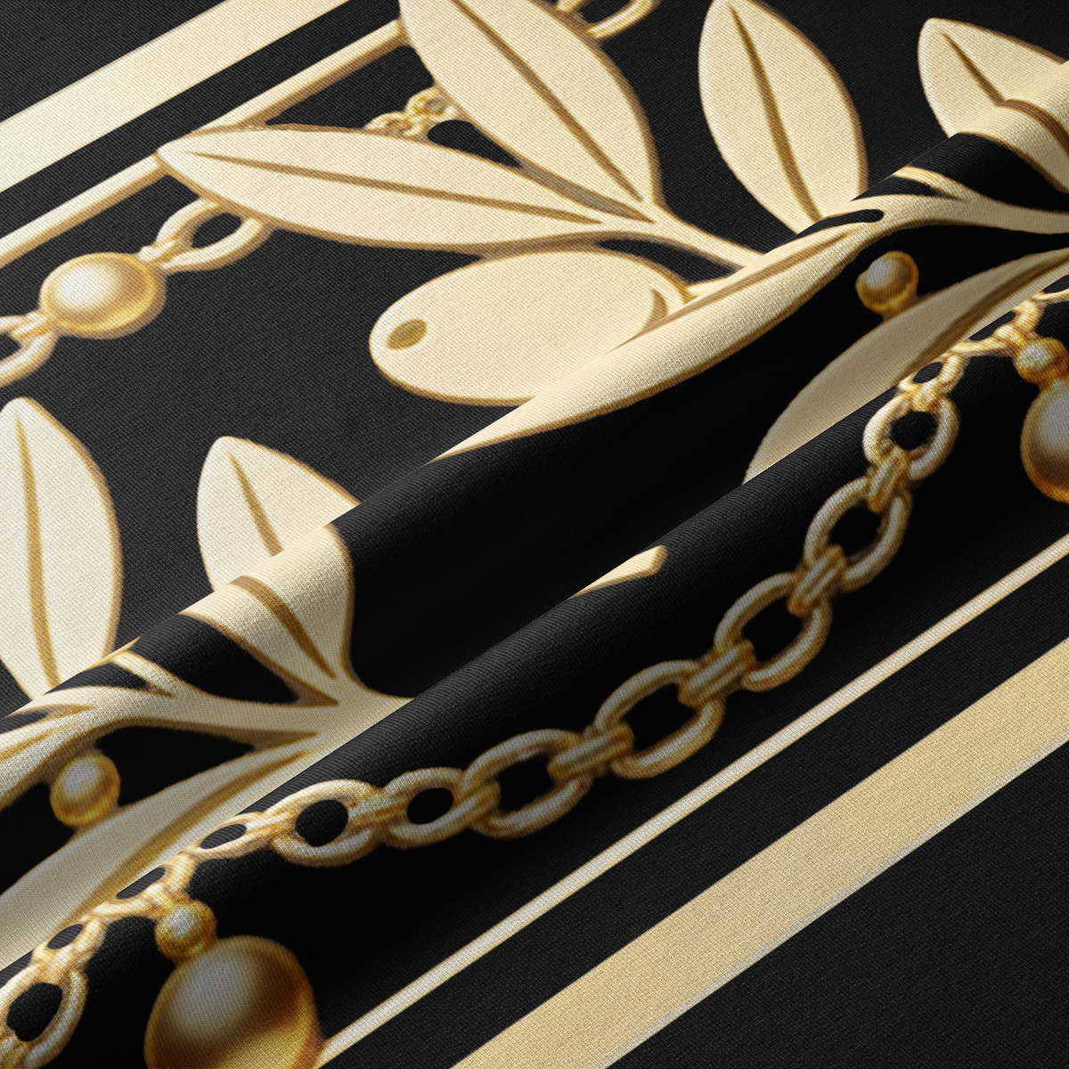 zbliżenie tkaniny pokazujące złote detale gałązek, łańcuszków i fakturę materiału