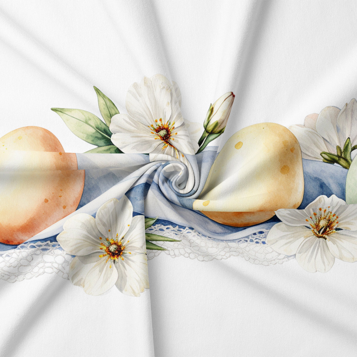 detal tkaniny z akwarelowymi pisankami i drobnymi białymi kwiatami na jasnym tle