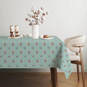 Widok stołu z wazonem z bawełnianymi gałązkami i deserami na tle geometrycznego wzoru