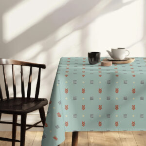 Kąt stołu z krzesłem, ukazujący brzeg obrusu i powtarzalny wzór