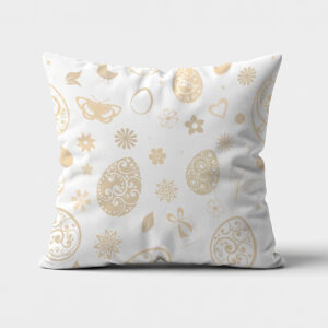 Poduszka z kremowymi pisankami i ozdobnymi kwiatami na białym tle, ujęcie z przodu
