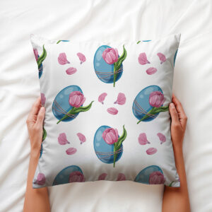 Zbliżenie na nadruk pokazujące niebieską pisankę i pąk różowego tulipana