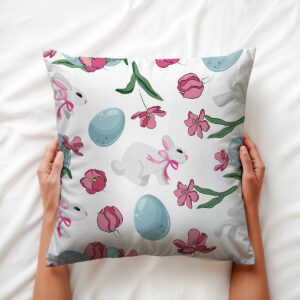 Zbliżenie na wzór z zającem w kokardce i pastelową pisanką